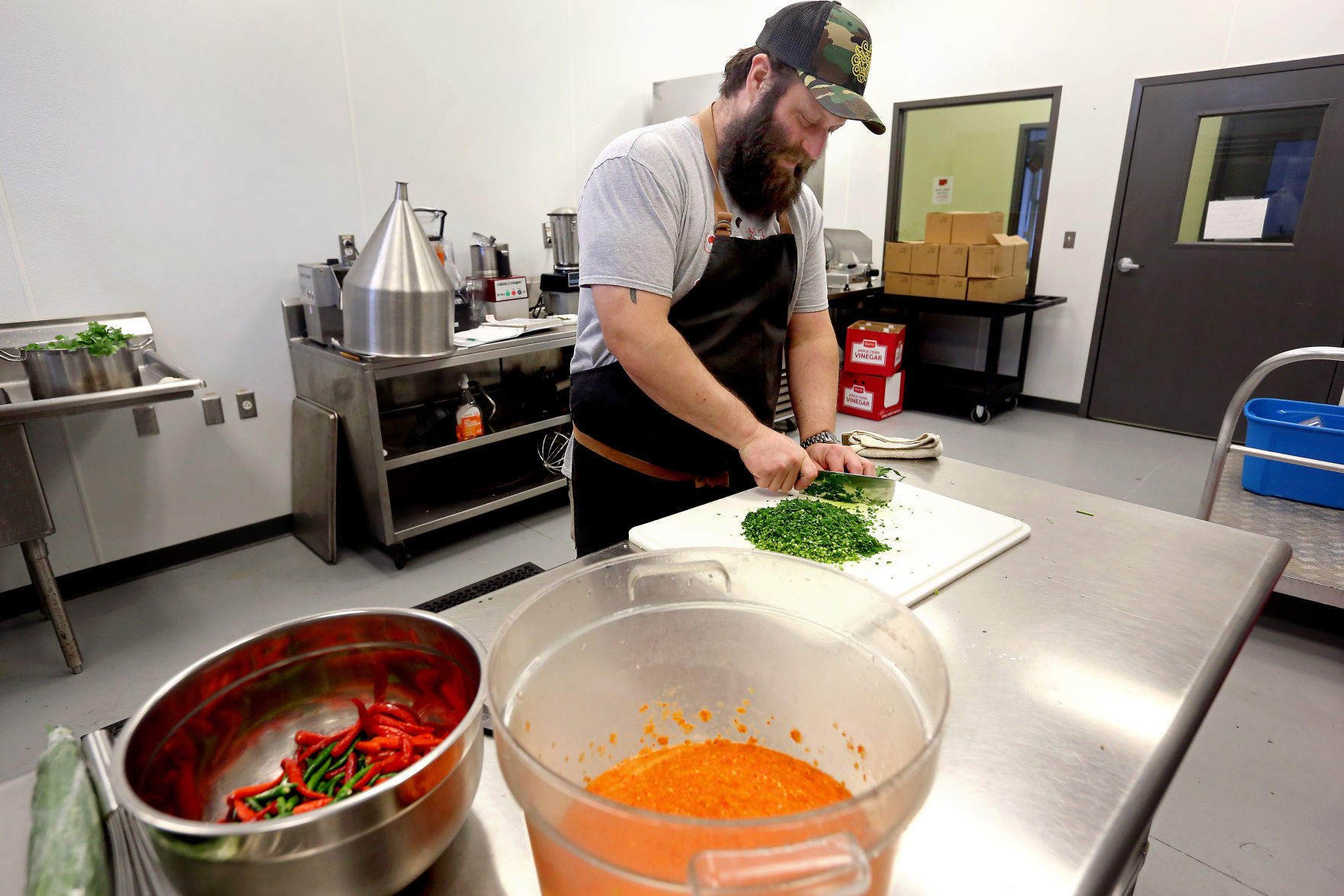 Bob Cook chopping herbs